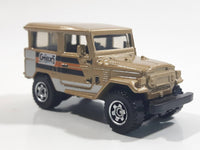 2013 Matchbox MBX Explorers Mountain Outdoors Sportsmen 1968 Toyota Land Cruiser (FJ40) Gold Die Cast Toy Car Vehicle