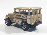 2013 Matchbox MBX Explorers Mountain Outdoors Sportsmen 1968 Toyota Land Cruiser (FJ40) Gold Die Cast Toy Car Vehicle