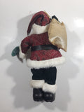 Santa Claus Kris Kringle Holding A Christmas Tree and Bag of Presents 13" Tall Porcelain Doll Christmas Decoration