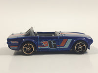 2010 Hot Wheels Faster Than Ever Triumph TR6 Blue #6 Die Cast Toy Race Car Vehicle