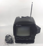 Vintage Curtis Portable TV 5" Black and White Television Model RT068 VHF/UHF AM/FM Radio with Car Cord and AC Adapter and Manuals In Box