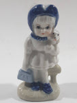 Vintage Blue and White Delft Style Girl Holding Puppy Porcelain Figure 3 3/4" Tall