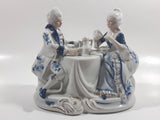Vintage French Colonial Man and Woman Sitting At A Table Drinking Tea Blue and White Porcelain Victorian Style Decorative Ornament