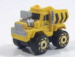 1987 Road Champs Dump Truck Yellow Micro Mini Die Cast Toy Car Construction Vehicle