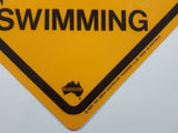 1985 The Great Australian Roadsign Co. Danger Crocodiles No Swimming Yellow Plastic Sign 14 7/8" x 14 7/8"