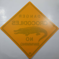1985 The Great Australian Roadsign Co. Danger Crocodiles No Swimming Yellow Plastic Sign 14 7/8" x 14 7/8"