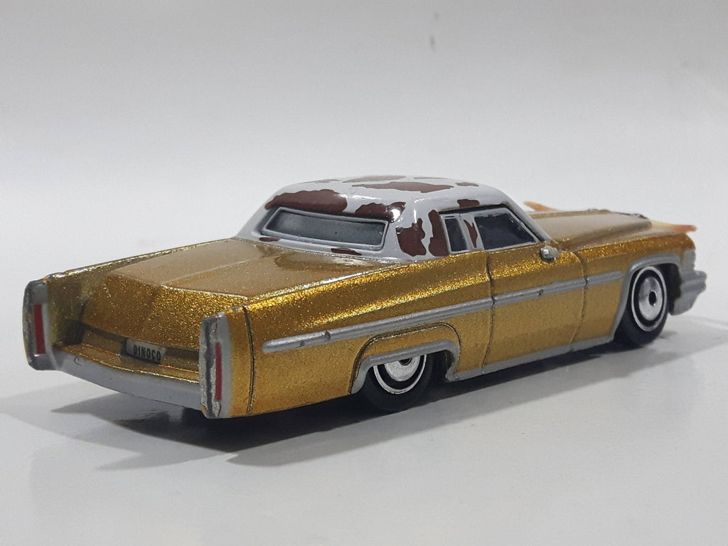 Disney Pixar Cars Cadillac Coupe de Ville Gold with Brown and White Co ...