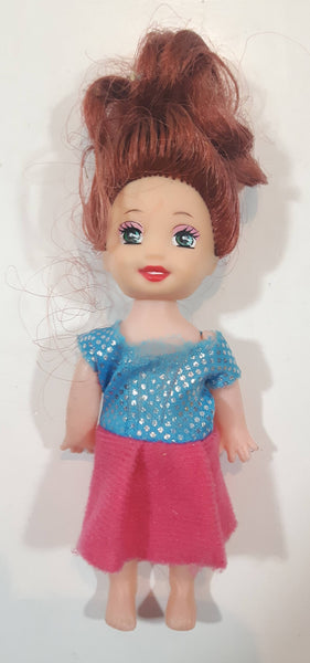 Girl in Pink Skirt and Blue Top 4" Tall Plastic Toy Doll