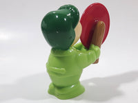 Man wearing Green Holding Red Plastic Saw 3" Tall Plastic Toy Figure