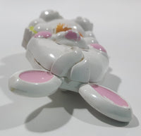 Vintage 1973 Avon Easter Bunny Shaped Solid Glace Scented Perfume Fragrance Compact White Plastic 1 3/8" x 2 5/8" Brooch Pin