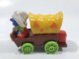 1987 Playskool Muppets Sesame Street Cowboy Grover Chuck Wagon Yellow and Brown Die Cast Toy Car Vehicle
