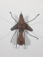 Yukon Mosquito Pine Cone and Wood Art Figure 5 1/4" Long