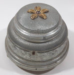 Antique 1935 Flower Embossed Round Aluminium Metal Musical Lidded Powder Box