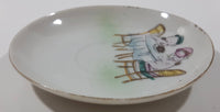 Vintage Occupied Japan Style Chubby Male and Female Nude Naked Cherub Like Characters Sitting At A Table 4 1/4" Diameter Hand Painted Porcelain Plate