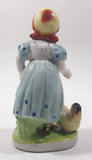 Antique 1945 to 1951 Occupied Japan Girl with Chicken Porcelain Lustreware 6" Tall Figure