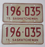 Set of Matching Vintage 1975 Saskatchewan Red Lettering White Vehicle License Plate Metal Tags 196 035