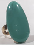 Turquoise Polished Stone Style Oval Shaped Gold Tone Metal Ring