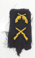 Vintage RCMP GRC Crossed Rifles and Crossed Revolver Hand Gun Fabric Shoulder Patch Insignia on Dark Brown Uniform