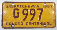 Vintage 1967 Saskatchewan Canada Centennial Maroon Letters Yellow Metal Government License Plate Tag G 997