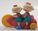 1998 Burger King Rugrats Phil and Lil Character on Bicycle 4" Long Plastic Toy Figure