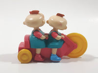 1998 Burger King Rugrats Phil and Lil Character on Bicycle 4" Long Plastic Toy Figure