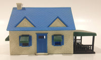 Blue and White Plastic Railroad Model House with Porch Building