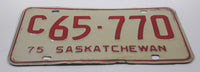 Vintage 1975 Saskatchewan Red Lettering White Commercial Vehicle License Plate Metal Tag C 65 770