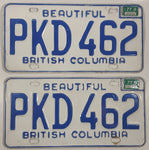 Matching Set of 1977 Beautiful British Columbia White with Blue Letters Vehicle License Plate PKD 462
