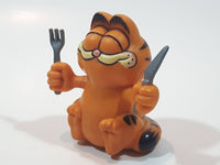 Vintage 1978 1981 United Features Syndicate Garfield Ready To Eat Holding Fork and Knife 2 1/4" Tall PVC Toy Figure Made in Hong Kong