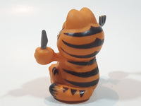 Vintage 1978 1981 United Features Syndicate Garfield Ready To Eat Holding Fork and Knife 2 1/4" Tall PVC Toy Figure Made in Hong Kong