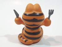 Vintage 1978 1981 United Features Syndicate Garfield Ready To Eat Holding Fork and Knife 2 1/4" Tall PVC Toy Figure Made in Hong Kong