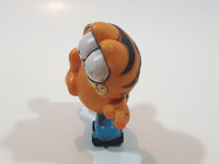 Vintage 1978 1981 United Features Syndicate Garfield Roller Skating 2 1/4" Tall PVC Toy Figure Made in Hong Kong