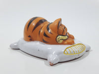 Vintage 1978 1981 United Features Syndicate Garfield Laying Sleeping On A White Pillow 2 1/2" Long PVC Toy Figure Made in Hong Kong