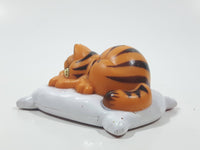 Vintage 1978 1981 United Features Syndicate Garfield Laying Sleeping On A White Pillow 2 1/2" Long PVC Toy Figure Made in Hong Kong