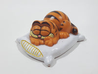 Vintage 1978 1981 United Features Syndicate Garfield Laying Sleeping On A White Pillow 2 1/2" Long PVC Toy Figure Made in Hong Kong