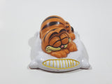 Vintage 1978 1981 United Features Syndicate Garfield Laying Sleeping On A White Pillow 2 1/2" Long PVC Toy Figure Made in Hong Kong