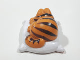 Vintage 1978 1981 United Features Syndicate Garfield Laying Sleeping On A White Pillow 2 1/2" Long PVC Toy Figure Made in Hong Kong