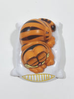 Vintage 1978 1981 United Features Syndicate Garfield Laying Sleeping On A White Pillow 2 1/2" Long PVC Toy Figure Made in Hong Kong