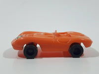 Vintage Goodyear Orange Plastic Toy Car Vehicle 2 1/2" Long Made in Hong Kong