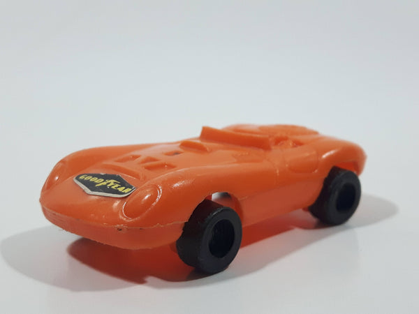 Vintage Goodyear Orange Plastic Toy Car Vehicle 2 1/2" Long Made in Hong Kong