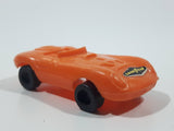 Vintage Goodyear Orange Plastic Toy Car Vehicle 2 1/2" Long Made in Hong Kong