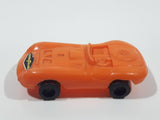 Vintage Goodyear Orange Plastic Toy Car Vehicle 2 1/2" Long Made in Hong Kong