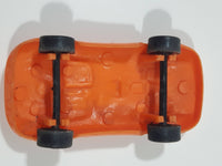 Vintage Goodyear Orange Plastic Toy Car Vehicle 2 1/2" Long Made in Hong Kong