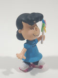 JP Just Play PNTS Peanuts Lucy Wearing Roller Skates Holding Rainbow Wind Pinwheel 3" Tall Vinyl Toy Figure