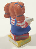 1984 OAA Panosh Place Cabbage Patch Kids Red Hair with Pigtails Sitting On Books Reading A Book 2 1/2" Tall PVC Toy Figure