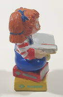 1984 OAA Panosh Place Cabbage Patch Kids Red Hair with Pigtails Sitting On Books Reading A Book 2 1/2" Tall PVC Toy Figure