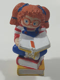 1984 OAA Panosh Place Cabbage Patch Kids Red Hair with Pigtails Sitting On Books Reading A Book 2 1/2" Tall PVC Toy Figure