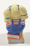 1984 OAA Panosh Place Cabbage Patch Kids Blonde Hair with Pigtails Sitting On Books Reading A Book 2 1/2" Tall PVC Toy Figure