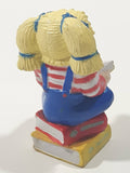 1984 OAA Panosh Place Cabbage Patch Kids Blonde Hair with Pigtails Sitting On Books Reading A Book 2 1/2" Tall PVC Toy Figure