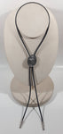 1987 Siskiyou Western Horse Head Outlined in Rope Pewter Metal Oval Shaped Black Draw String Bolo Tie
